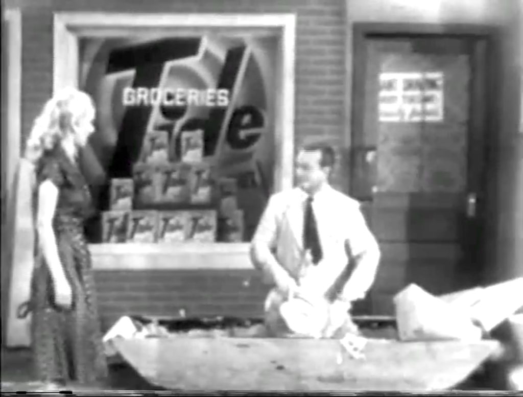 Lucille Knoch makes a comment to Red Skelton as he's covered in cement in the Tide commercial