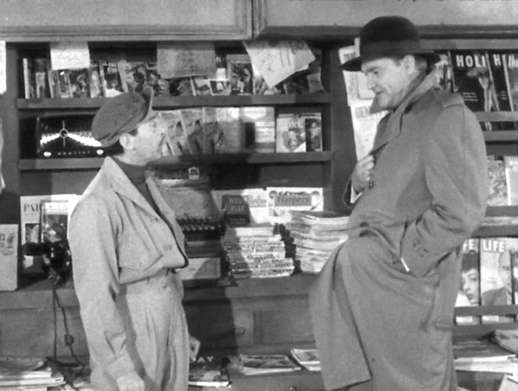 Red Skelton pretending to be a crook buying a detective story at the magazine stand