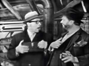 Professor Munson (Richard Deacon) and Freddie the Freeloader (Red Skelton)