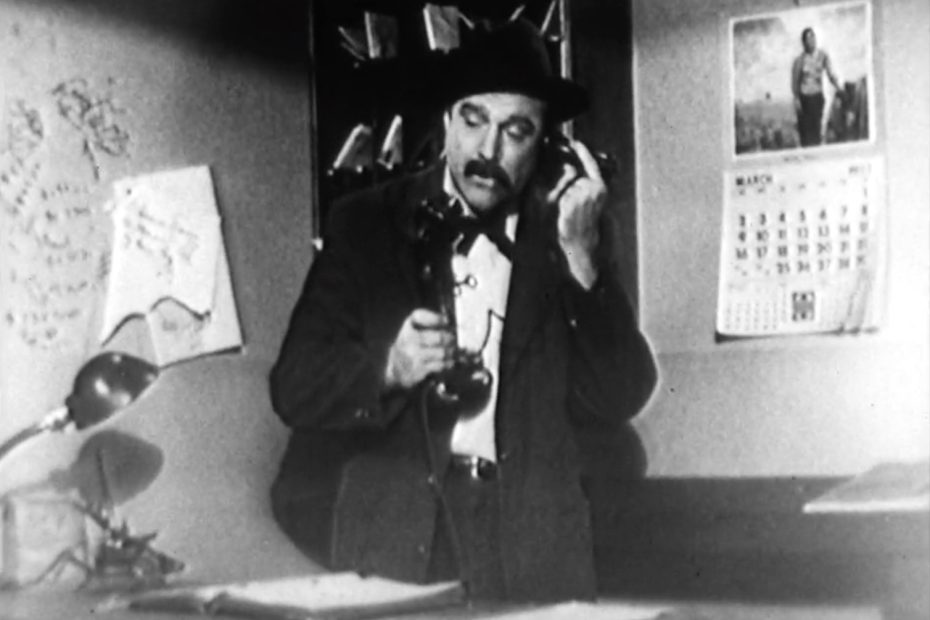 Pasquale (Red Skelton) answering the phone in "Pasqual's Hotel"