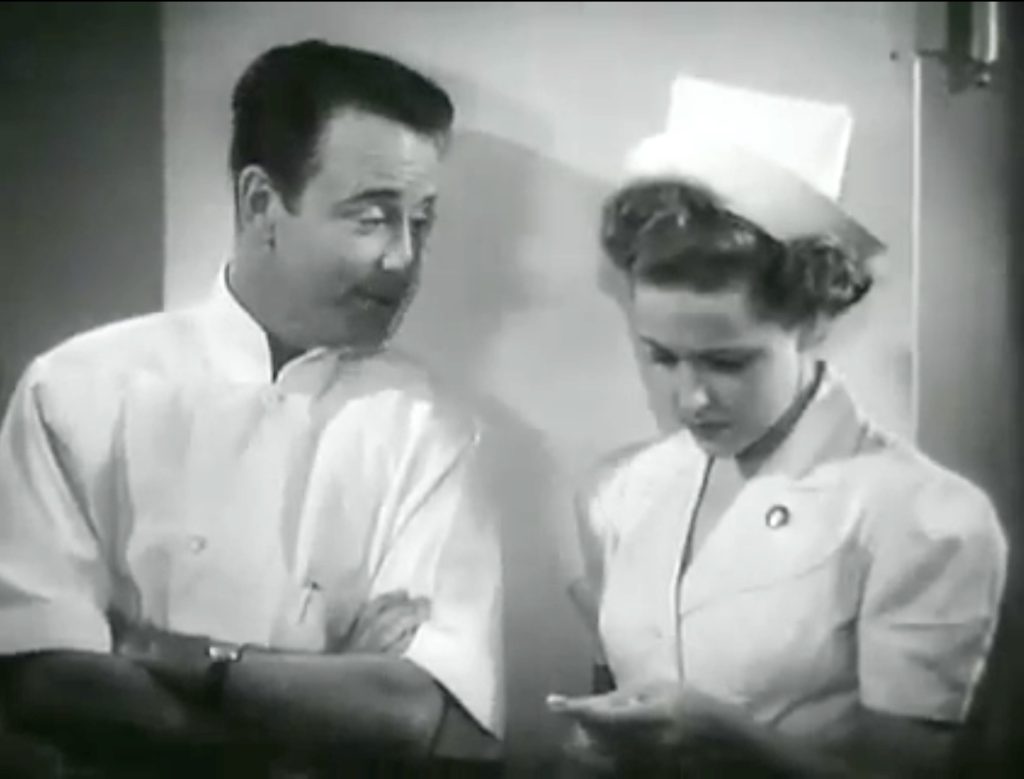 We'll need to postpone our wedding until after the trial - the suffering Dr. Kildare (Lew Ayres) and Nurse Mary Lamont (Laraine Day)