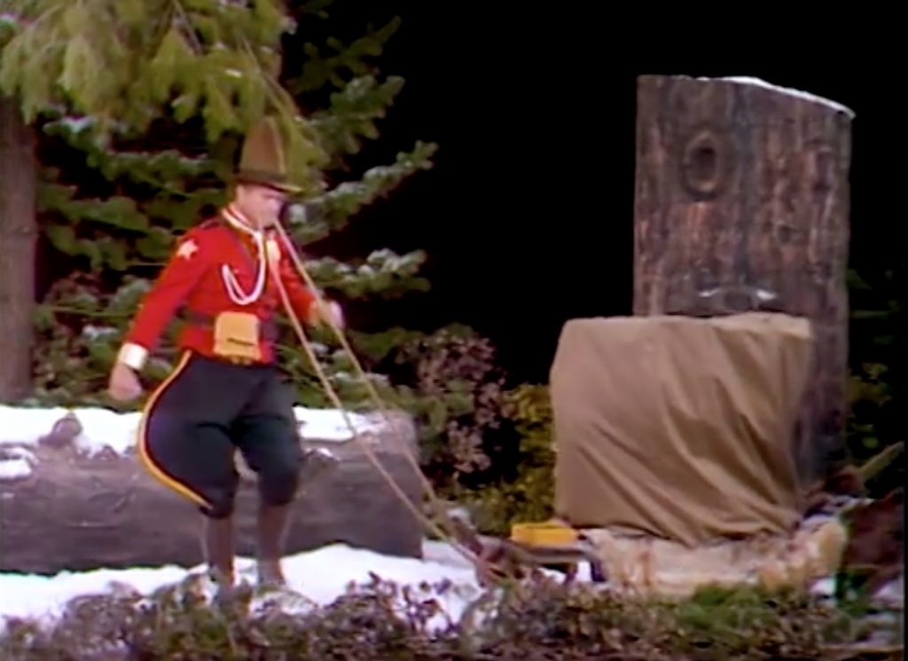 Red Skelton as a RCMP Mountie in the Silent Spot in "The House That Junk Built"