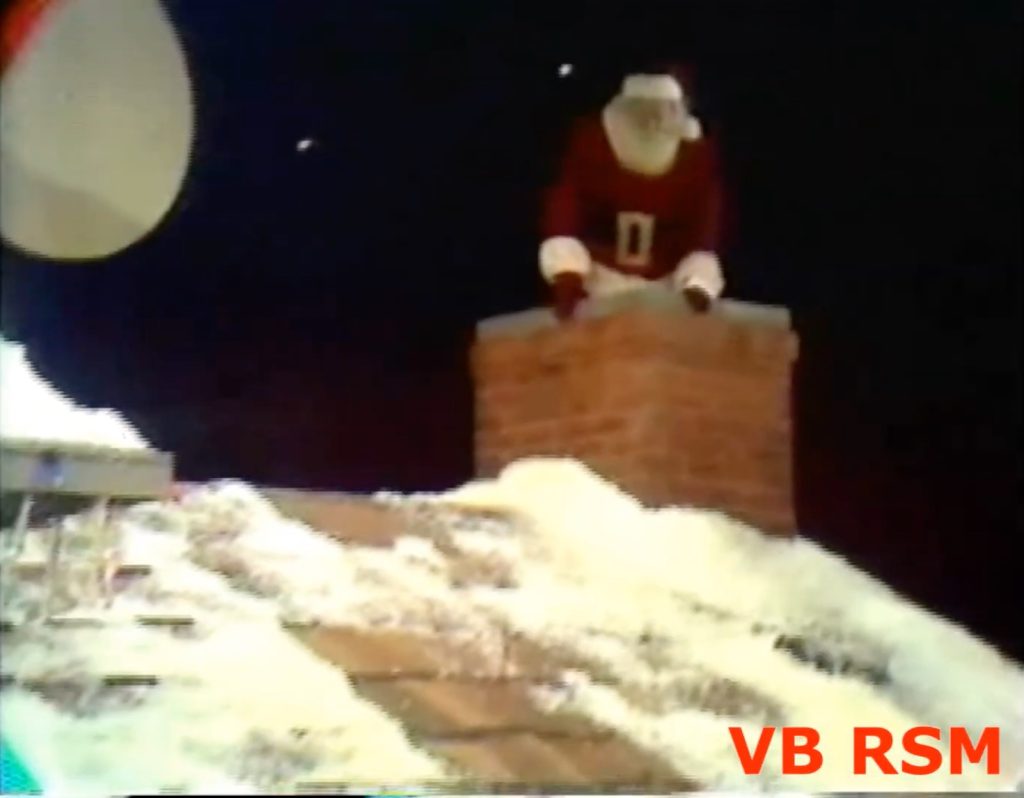 The *real* Santa Claus climbs out of the chimney while they're arguing