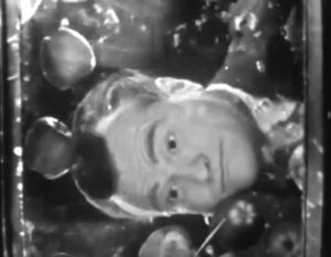 Red Skelton demonstrates bobbing for apple in "Halloween Show"