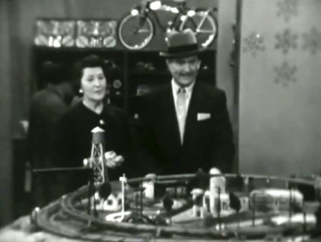 Red Skelton destroys the train set at the store!