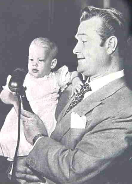 Red Skelton holding baby Valentina