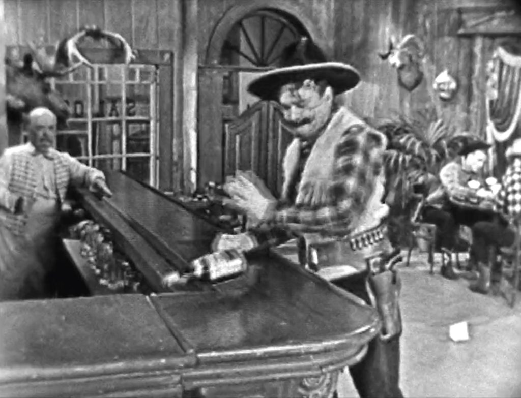 Deadeye says, Slide me a bottle of whiskey - whoops!