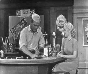 Red Skelton as soda jerk, Lucille Knoch as customer, in "G. I. McPugg"