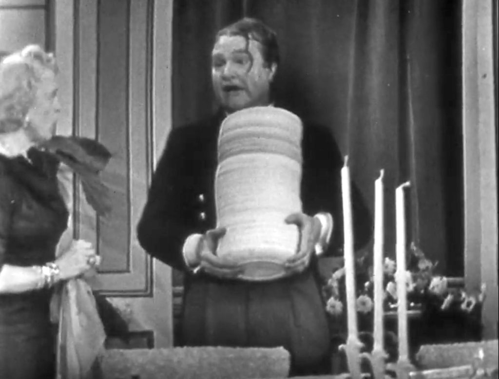 Clem Kadiddlehopper with a stack of plates at Cobina Wright's dinner party -- you KNOW what's about to happen!