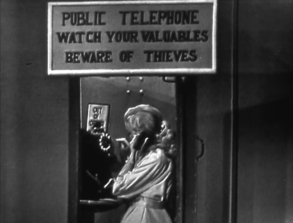 Lucy Knoch in the telephone booth in "Telephone Trouble"