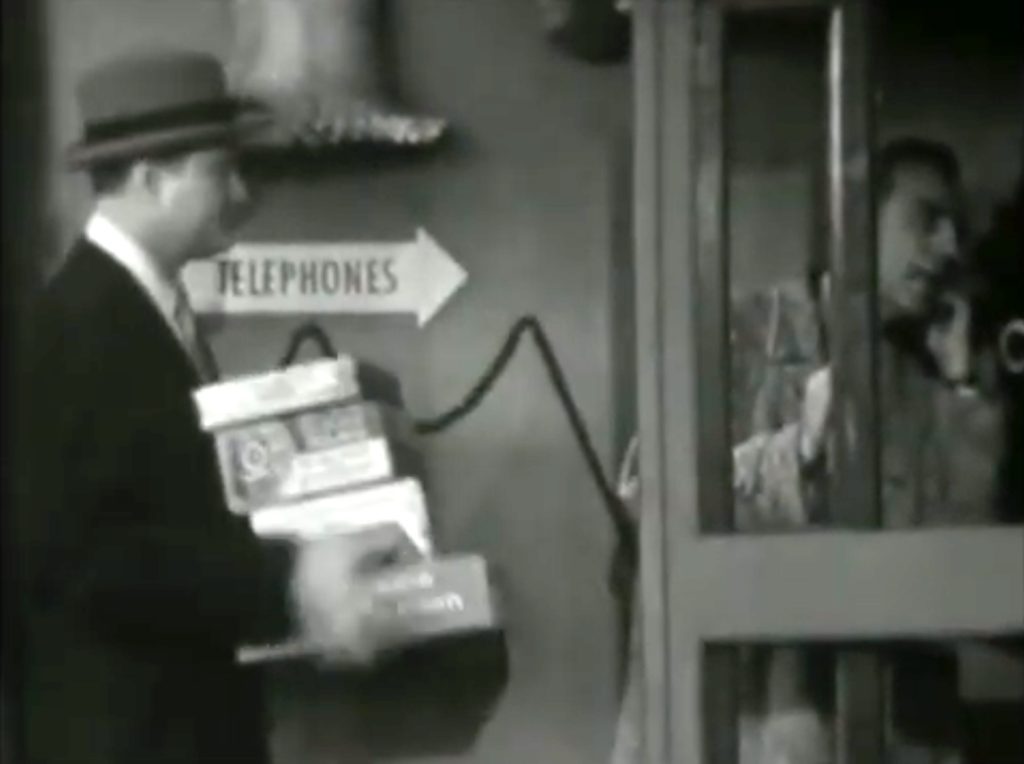 Red Skelton doing a telephone booth routine