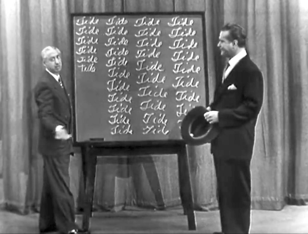 Poor Benny Rubin has to write "Tide" on the chalkboard - Red Skelton making a joke out of his misspelling the sponsor's name last week!