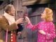Freddie the Freeloader and Greer Garson toast each other a Merry Christmas