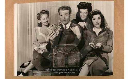 Red Skelton and the ladies with the treasure in "Whistling in Dixie"