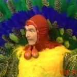 Red in costume in The Silent Spot - The Thanksgiving Turkey, on The Red Skelton Hour episode, "Sit down on my lap, dummy boy"