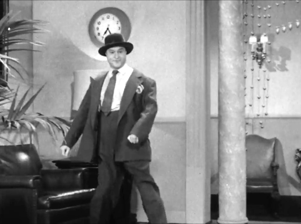 Red Skelton impersonates a drunk at a hotel