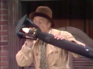 Willy Lump-Lump lighting his cigar from a streetlight in "The Pie-Eyed Piper"